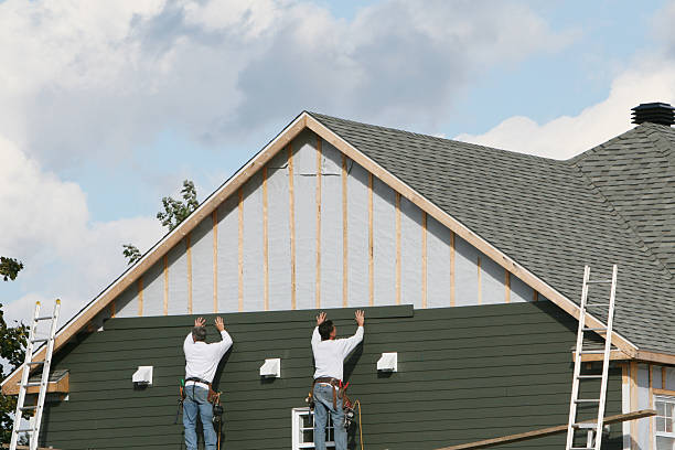 Professional Storm Damage Siding Repair technician working in Nova, OH